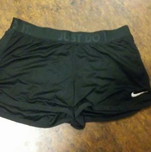 Black Nike running shorts